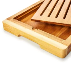 Brotschneidebrett Mit Krümelfach Bambus 38 X 3 X 25,5 Cm (BxHxT) Recycelbar 2 Brotschneidebrett Mit Krümelfach Bambus 38 X 3 X 25,5 Cm (BxHxT) Recycelbar -Klarstein Verkaufs 10038056 yy 0003 logo
