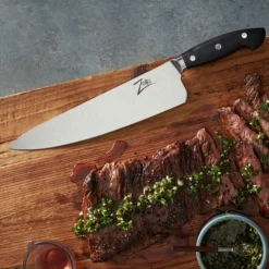 Executive-Plus Serie 10" Kochmesser 61 HRC Damaszenerstahl 2 Executive-Plus Serie 10" Kochmesser 61 HRC Damaszenerstahl -Klarstein Verkaufs 10039013 de 0003 logo